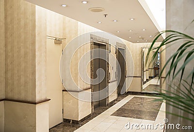 Elevators in Lobby of Modern Building. Stock Photo