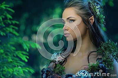 Elf woman in a forest Stock Photo