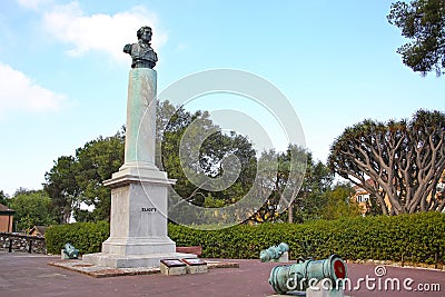 The Eliott Memorial column surrounded by cannons inside the La Alameda Gardens which are a botanical gardens in Gibraltar. Stock Photo