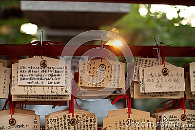 Ema are small wooden plaques, common to Japan, in which Shinto and Buddhist worshippers write prayers or wishes Editorial Stock Photo