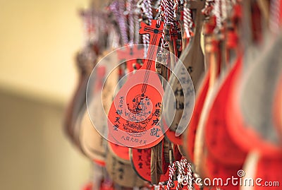 Ema votive plaques in shape of Japanese Biwa instrument in Kaneiji temple. Editorial Stock Photo