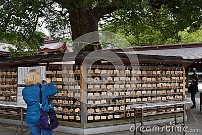 Wooden plaques with wishes at Meiji Shrine in Tokyo Editorial Stock Photo