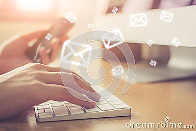 Email marketing and newsletter concept, Hand of man sending mess Stock Photo