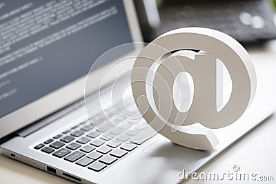 Email symbol on laptop computer Stock Photo