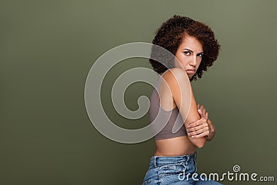 Embarrassed african american woman in top Stock Photo