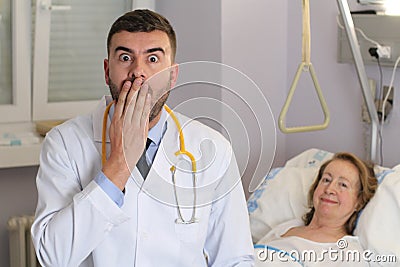 Embarrassed doctor making a mistake Stock Photo