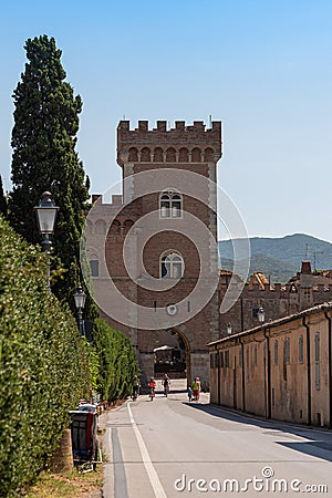 Embattled Tower of the Medieval Castle at the Entrance to the Village of Bolgheri Editorial Stock Photo