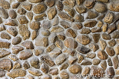 Embed stone in cement wall Stock Photo