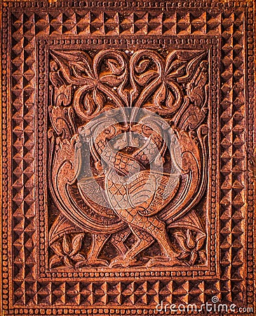 Wood carvings of embekka devalaya Stock Photo