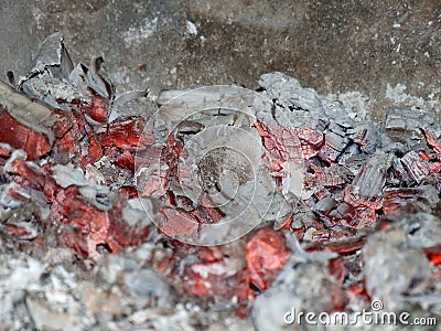 Embers in stove Stock Photo