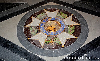 Emblem on the floor of the tomb of the French Emperor Napoleon I Editorial Stock Photo