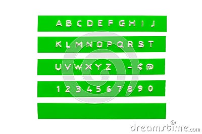 Embossed alphabet on green plastic tape Stock Photo
