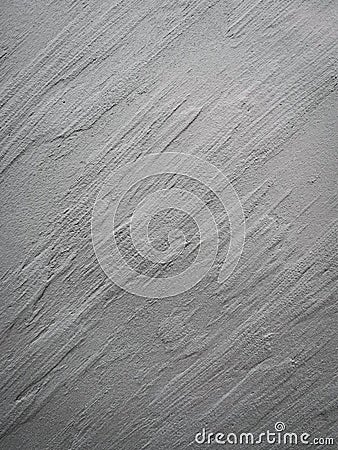 Embossed plaster on the wall in graphite color Stock Photo