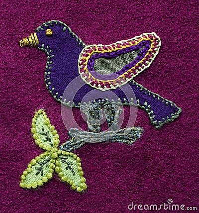 Embroidered bird Stock Photo