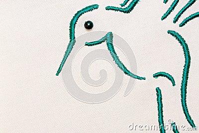 Embroidered bird green Stock Photo