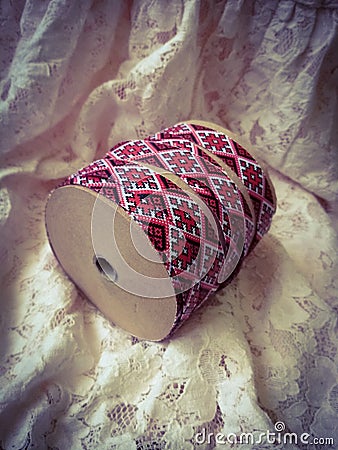 Embroidered toilet paper roll Stock Photo