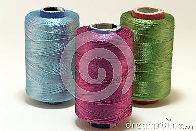 Embroidery yarn bobbins Stock Photo