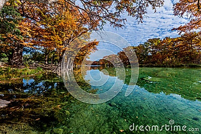 Emerald Water and Bright Fall Foliage at Garner State Park, Texas Stock Photo