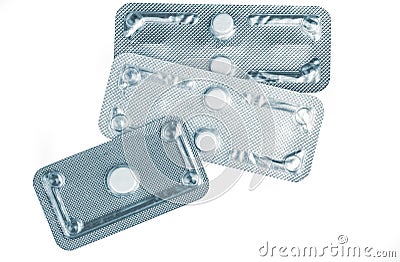 Emergency contraceptive pills in blister pack on blurred background of morning after pills. Drug cause of ectopic pregnancy. Stock Photo