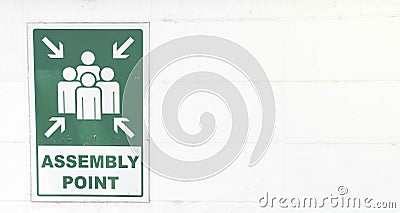 Emergency evacuation assembly point sign, gathering point signboard in the departmenstore Stock Photo
