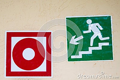 Emergency exit signs green and red Stock Photo