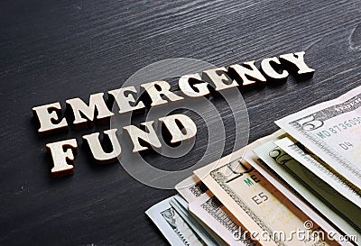 Emergency fund from wooden letters. Stock Photo