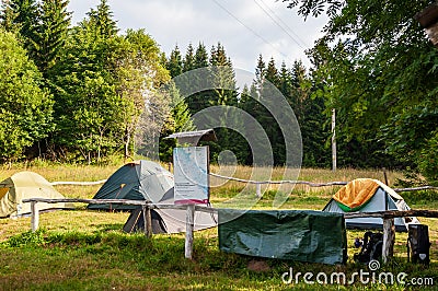 Emergency overnight campsite BuÄina Sumava, Bohemian Forest, BÃ¶hmerwald, Czech Republic. Several tents camping on grass in Editorial Stock Photo