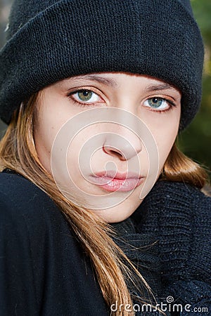 EMILY SAARI wearing winter mittens, scarf and hat Stock Photo