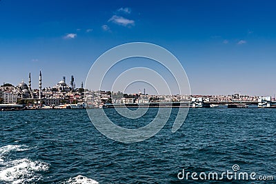 A view of Eminonu district and Galata Bridge from the Golden Horn Bay Stock Photo
