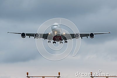 Emirates airlines plane landing Editorial Stock Photo