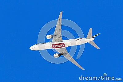 Emirates climbing to cruising altitude Editorial Stock Photo