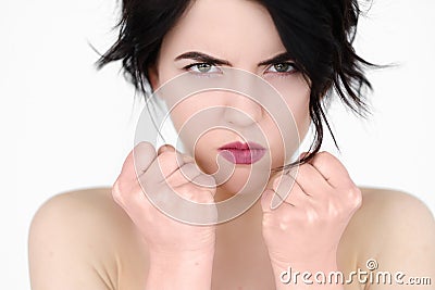 Emotion face angry mad cross furious clenched fist Stock Photo
