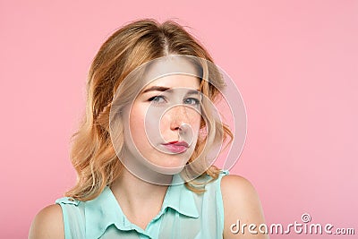 Emotion suspicious dubious woman distrustful look Stock Photo