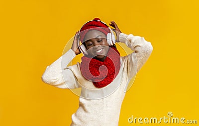 Emotional black girl listening to music with closed eyes Stock Photo