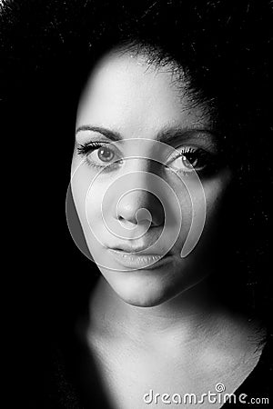 Emotional black and white image of a young woman Stock Photo