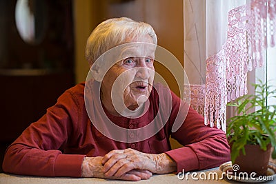 Emotional elderly woman, a portrait. Stock Photo