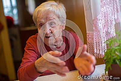 Emotional elderly woman, a portrait. Stock Photo