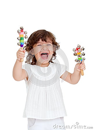 Emotional kid playing with musical toy Stock Photo