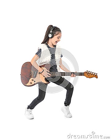 Emotional little girl playing guitar Stock Photo