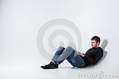 Emotional man and notebook Stock Photo