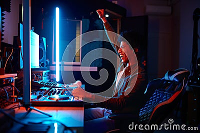 Emotional music sound producer at workplace Stock Photo