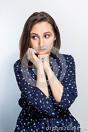 Emotional portrait of a gorgeous young brunette girl. attractive asian woman thinking, sad Stock Photo