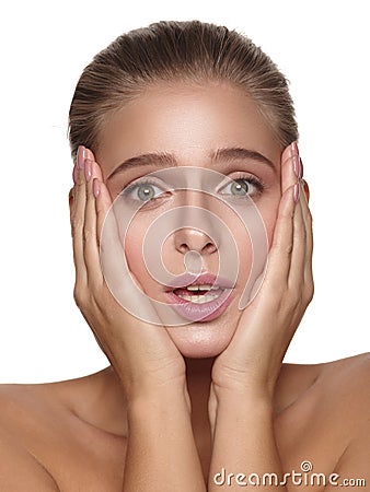 Emotional portrait of a young european girl with pure and healthy glowing smooth skin without makeup Stock Photo