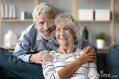 Emotional positive retired married couple looking at camera. Stock Photo