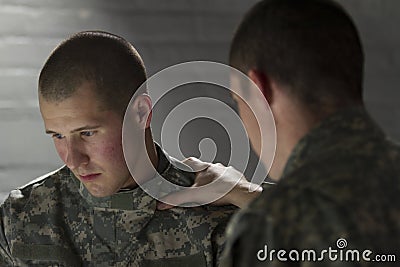 Emotional soldier talking with peer, horizontal Stock Photo