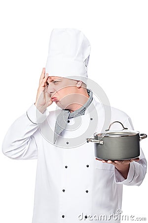Emotional upset unsuccessful dish cook in a pot on a white Stock Photo