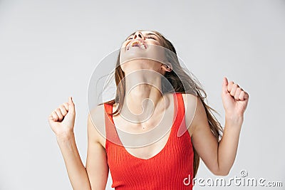 Emotional woman tilted her head up emotions red t shirt Stock Photo