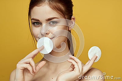emotional women bare shoulders cotton pads and clear skin attractive look Stock Photo
