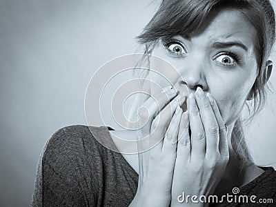 Nervous lady expressing fear. Stock Photo