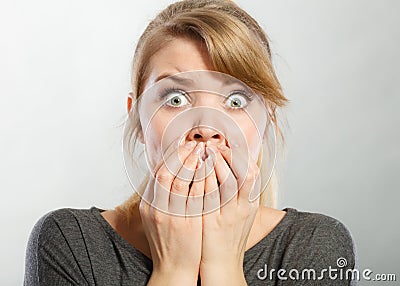 Nervous lady expressing fear. Stock Photo